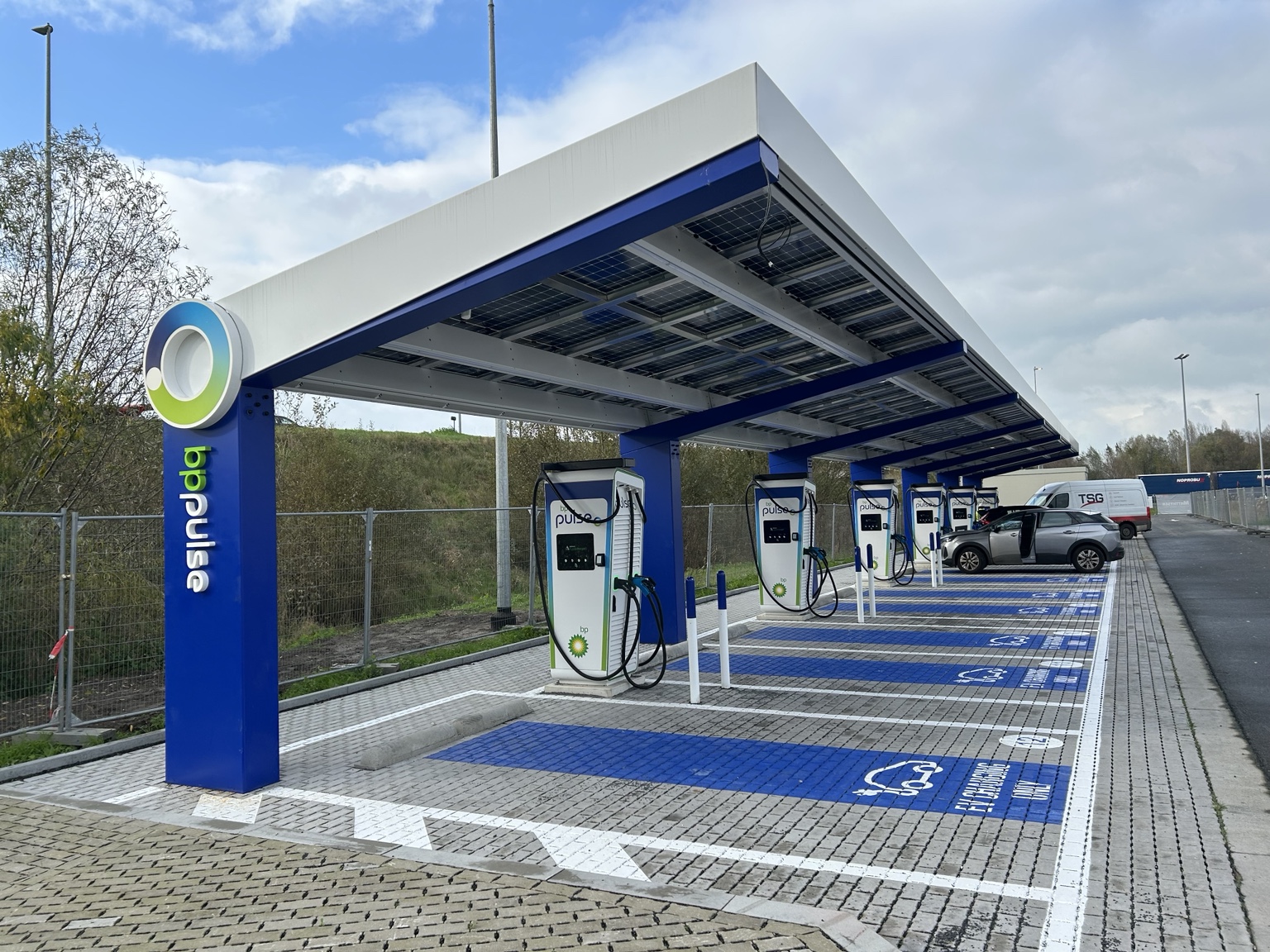 EV charging row under solar canopy