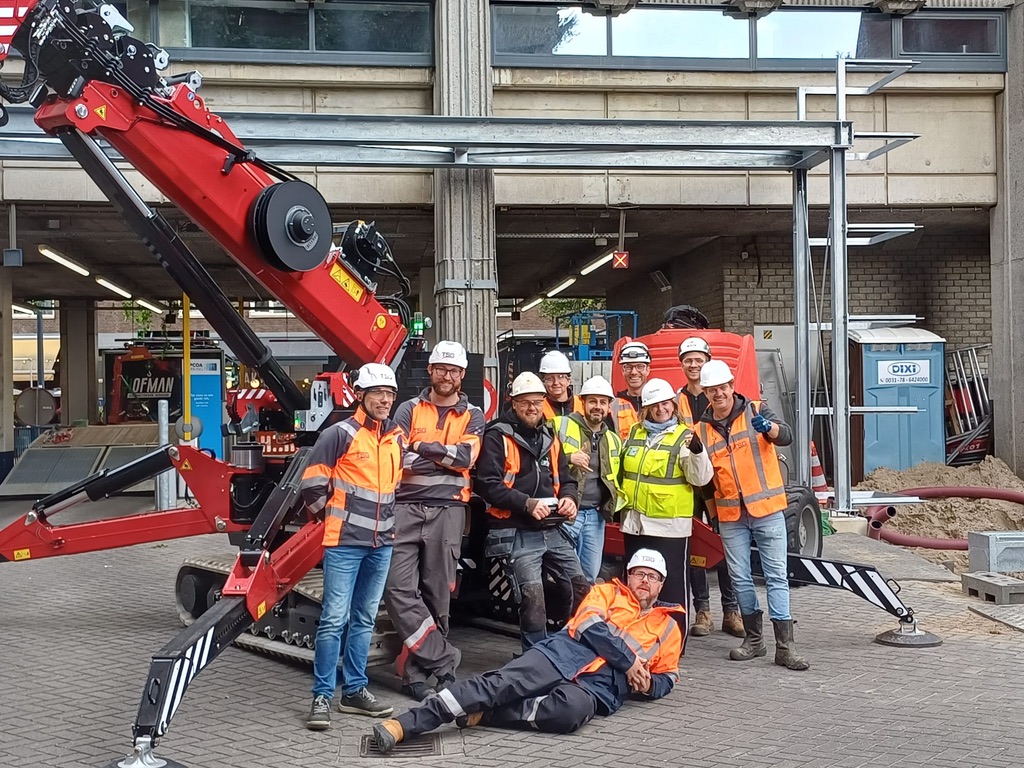 Construction team with crane